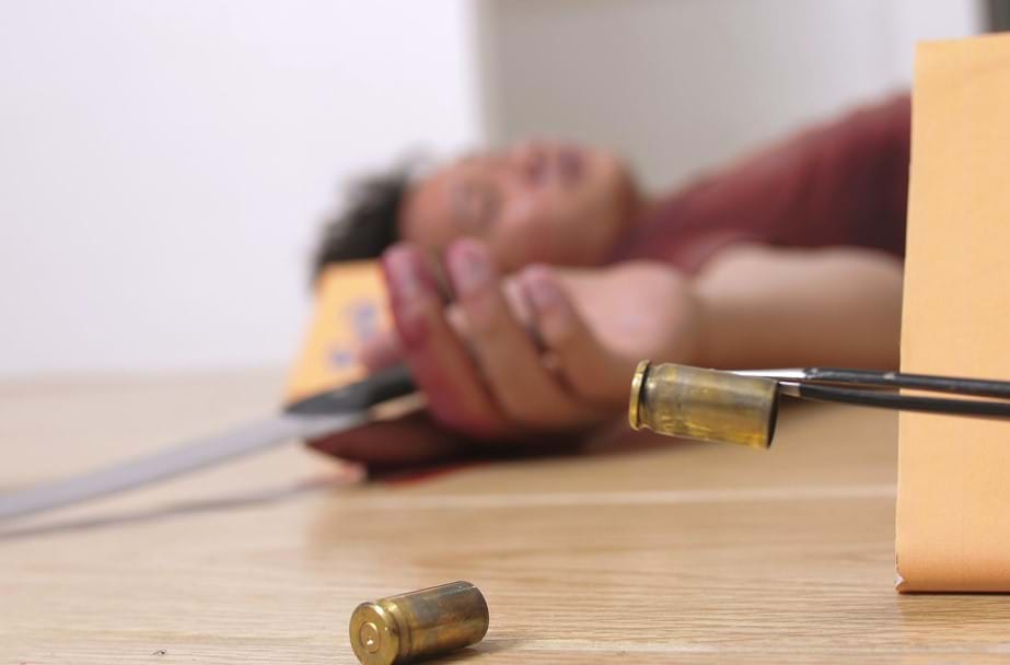 Female victim at a gun-related crime scene